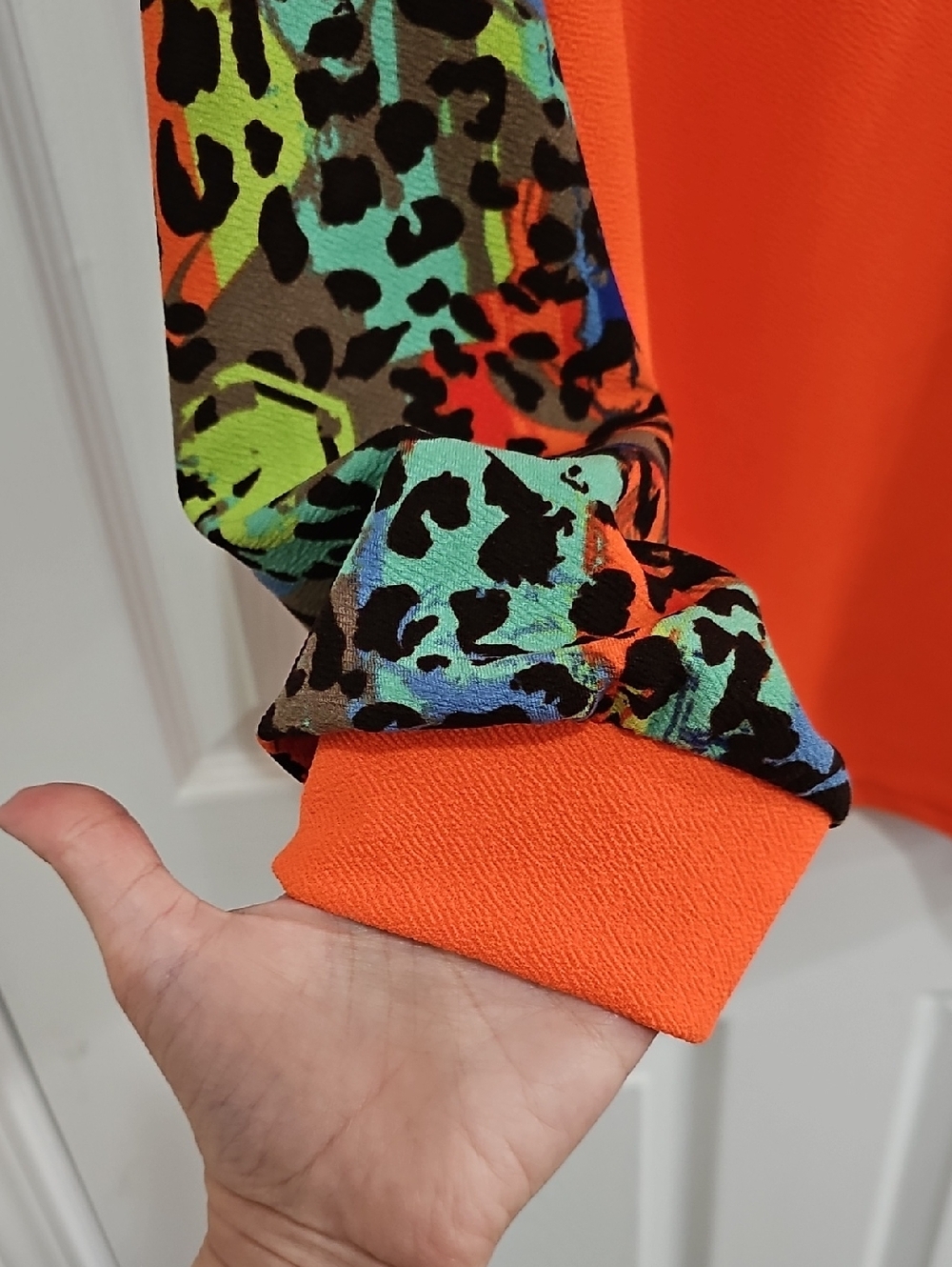 Women's Orange Sweatshirt with Multicolor Animal-Print Raglan Sleeves - Picture 6 of 7